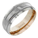 A textured white gold exterior conceals a rose gold interior accent in this elegant, modern wedding band