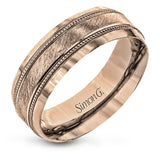 A textured white gold exterior conceals a rose gold interior accent in this elegant, modern wedding band