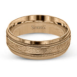 A textured white gold exterior conceals a rose gold interior accent in this elegant, modern wedding band