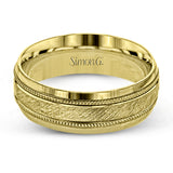 A textured white gold exterior conceals a rose gold interior accent in this elegant, modern wedding band