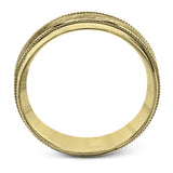 A textured white gold exterior conceals a rose gold interior accent in this elegant, modern wedding band