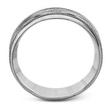 A textured white gold exterior conceals a rose gold interior accent in this elegant, modern wedding band