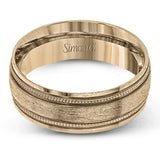 A textured rose gold exterior conceals a classic white gold interior in this elegant, modern wedding band