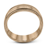 A textured rose gold exterior conceals a classic white gold interior in this elegant, modern wedding band