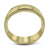 A textured rose gold exterior conceals a classic white gold interior in this elegant, modern wedding band