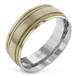 A textured rose gold exterior conceals a classic white gold interior in this elegant, modern wedding band