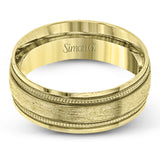 A textured rose gold exterior conceals a classic white gold interior in this elegant, modern wedding band