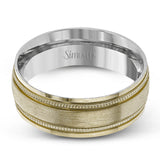 A textured rose gold exterior conceals a classic white gold interior in this elegant, modern wedding band