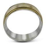 A textured rose gold exterior conceals a classic white gold interior in this elegant, modern wedding band