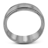 A textured rose gold exterior conceals a classic white gold interior in this elegant, modern wedding band