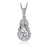 This classic, elegant white gold pendant features .16 ctw of round white diamond accents in a vintage-inspired setting.