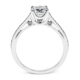 Sleek and lovely, this white gold engagement ring has an elegant design enhanced with .14 ctw of round white diamonds.