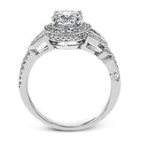 The stunning nature-inspired design of this white gold engagement ring features lovely milgrain edging and a total of .34 ctw of round white diamond accents.