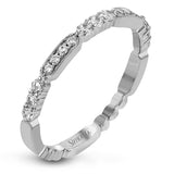 From our stackable collection, this lustrous diamond band has  0.15 ctw of brilliant white diamonds along the shank.
