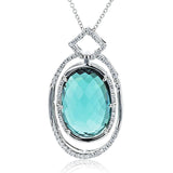 This 18k white gold pendant has an incredible 9.13 ct green tourmaline center stone set within a geometric diamond design.