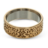 This wedding band's elegant, textured design in rose gold is accented by a simple white gold interior