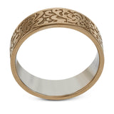 This wedding band's elegant, textured design in rose gold is accented by a simple white gold interior