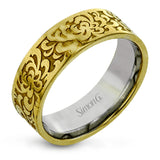 This wedding band's elegant, textured design in yellow gold is accented by a simple white gold interior