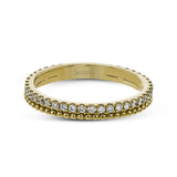 A line of .33 ctw of white diamonds sits alongside a row of granulation in this band that adds the ideal touch of shine. Perfect for stacking with other rings.