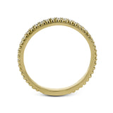 A line of .33 ctw of white diamonds sits alongside a row of granulation in this band that adds the ideal touch of shine. Perfect for stacking with other rings.