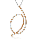 This modern white gold pendant's abstract, swooping shape is set with .29 ctw of glimmering white diamond accents