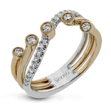 Uniquely modern, this wedding band contains .34 ctw of round white diamonds set in multiple rose gold prongs with a white gold contrast band.