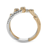 Uniquely modern, this wedding band contains .34 ctw of round white diamonds set in multiple rose gold prongs with a white gold contrast band.