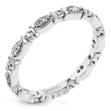 This 18k white gold band is perfect for layering with others, or could also be used unique wedding band, and contains .31 ctw of white diamonds. Perfect for stacking.