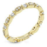 This 18k yellow gold band is perfect for layering with others and contains .31 ctw of white diamonds. Perfect for stacking.