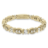 This 18k yellow gold band is perfect for layering with others and contains .31 ctw of white diamonds. Perfect for stacking.