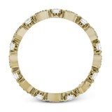 This 18k yellow gold band is perfect for layering with others and contains .31 ctw of white diamonds. Perfect for stacking.
