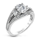 This remarkable white gold ring shows off an oval shaped centerpiece flanked by .47 ctw of trapezoid shaped white diamonds alongside .27 ctw of round white diamonds.
