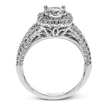 This elegant, contemporary design in white gold sparkles with .45 ctw of round white diamonds in its halo and split shank.