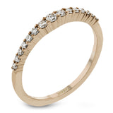 This lovely band comes in all tones of gold that can be stacked together to form one larger look, or worn separately. Each band contains .26 ctw of shining white diamonds.