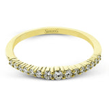 This lovely band comes in all tones of gold that can be stacked together to form one larger look, or worn separately. Each band contains .26 ctw of shining white diamonds.