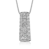 This shimmering white gold pendant dazzles with an incredible 1.50 ctw of white diamonds set into its surface