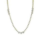 This deceptively delicate white gold necklace is in fact quite substantial, featuring an incredible 9.88 ctw of round white diamonds
