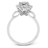 This stunning, contemporary design features .36 ctw of round white diamonds set in its exaggerated halo and delicate side details to evoke a charming floral motif.