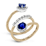 1.40 ctw of sapphires sparkle at the ends of this comfortable, segmented rose gold coil, with .38 ctw of round white diamonds glimmering in white gold accents.