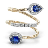 1.40 ctw of sapphires sparkle at the ends of this comfortable, segmented rose gold coil, with .38 ctw of round white diamonds glimmering in white gold accents.