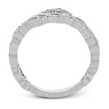 This nature-inspired 18k white gold band is set with the perfect touch of .13 ctw of white diamonds.