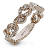 This nature-inspired 18k white gold band is set with the perfect touch of .13 ctw of white diamonds.