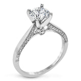 This absolutely stunning white gold engagement ring features a sleek design with .21 ctw of round white diamonds for a touch of glamour.