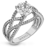 Delicate, overlapping tendrils of white and rose gold sparkle with .52 ctw of round white diamonds for a contemporary, nature-inspired design.