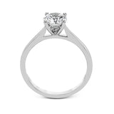 The clean lines of this white gold ring perfectly frame a single round stone as a centerpiece.