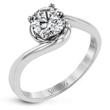 This beautiful contemporary design in white gold combines simplicity and a gracefully curved shank to accentuate a single, central stone.