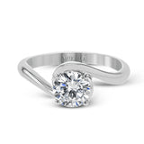 This beautiful contemporary design in white gold combines simplicity and a gracefully curved shank to accentuate a single, central stone.