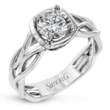 The flowing, organic lines of this contemporary, nature-inspired white gold ring provide a beautifully understated setting for a single, central stone.