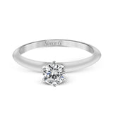 This contemporary, minimalist design in white gold is the perfect way to highlight a single round stone as a centerpiece.