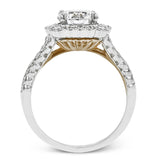 This engagement ring has a unique design with a halo of bezel set diamonds. The setting contains .81 ctw of white diamonds.